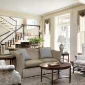 the former mansion that has become The Hearth at Drexel features a large staircase, great natural light in its lobby, and a pleasant sitting area for residents and guests